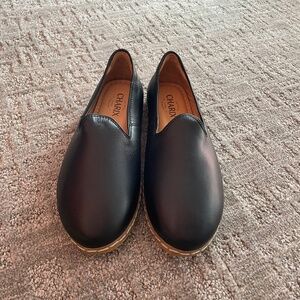 Brand new, never worn Charix Classic Black Leather Slipons